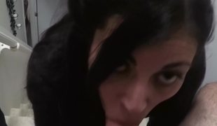 Good-looking brunette dame actively sucks dick and balls