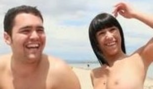 Very sexy topless chicks on a beach