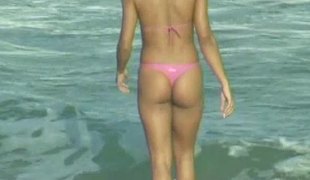 Smoking hot Latina babe in a bikini receives a facial
